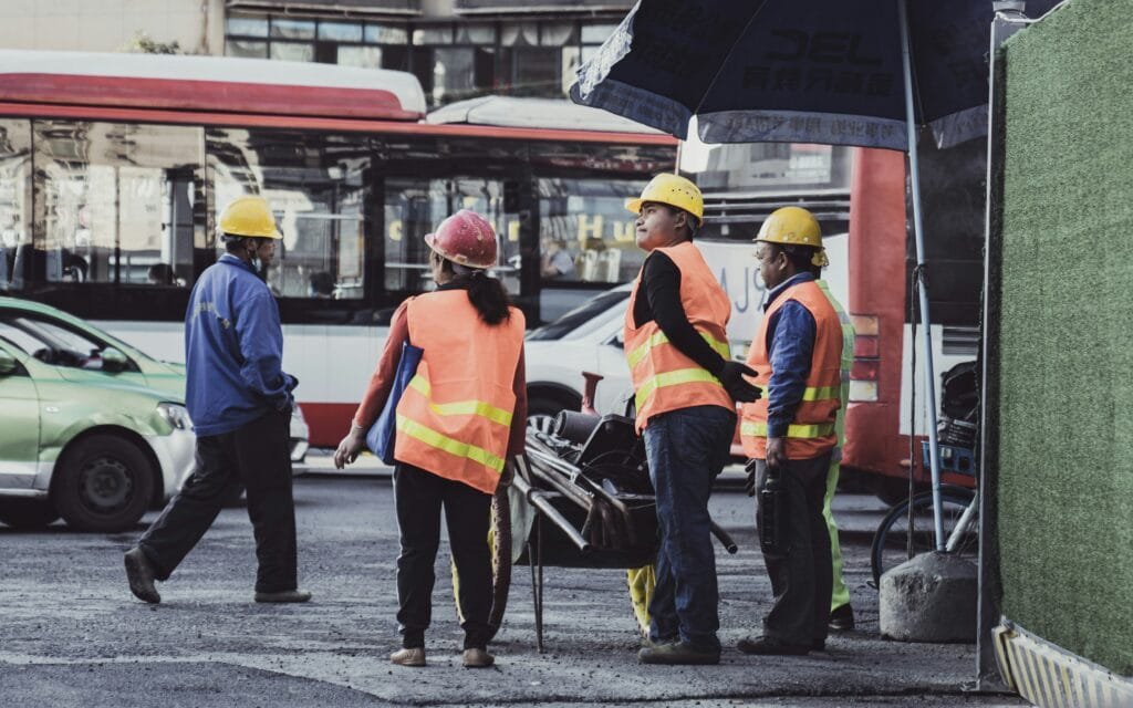 Work Abroad Programs : A group of workers working abroad.