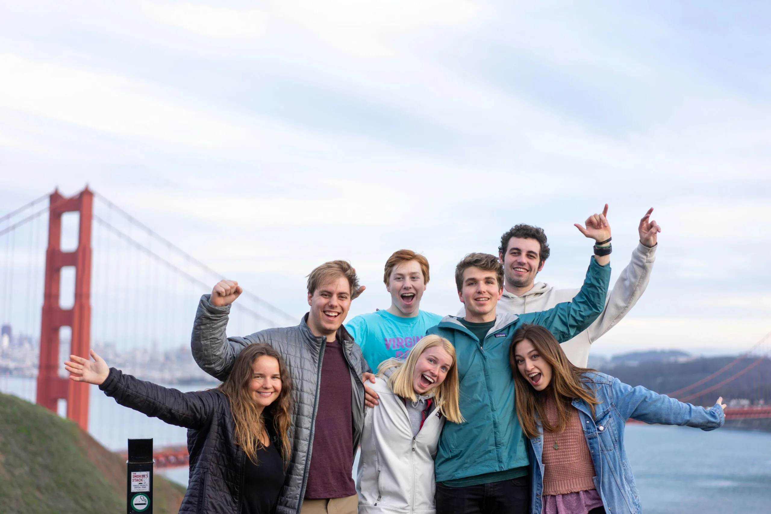 Study Abroad Programs in Germany international students celebrating academic success near a famous landmark